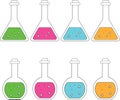 Chemical flasks with color solutions, round and triangular.